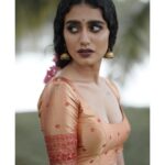 Priya Varrier Instagram - 🍂 Stylist : @asaniya_nazrin Photography : @jeesjohnphotography MUAH : @samson_lei Outfit : @poornimaindrajith Jewellery : @francisalukkas Location : @kondai_lip_resort Costume assistant : @ashwathy_sethunath