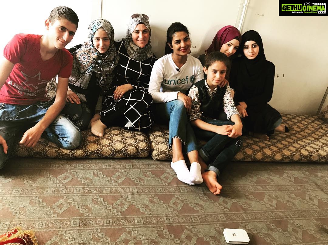 Priyanka Chopra Instagram - At Za'atari, I'm proud to have had the opportunity to visit the home of Seba and her whole family - Mohammed, 19; Seba, 17; Haya 14; Hiba, 12; Omar, 6; Hala, 4. In spite of their circumstances, their makeshift home, and very little to call their own, we were the recipients of the full Syrian hospitality and love. Her mother, Isdihaar, a dignified and happy spirit was so open about her earlier life, and all that they do now to survive. They had a full life in Syria, with a home and everything they could ask for, and now...sitting in their sparse living room, all I got was a resolve to hold on until they could return to their home and rebuild their life. Without her husband there, she's taking care of her 6 children by working at an innovation lab, finding innovative solutions for everyday problems...like the neo-natal air conditioner created by just using a fan, ice cubes and box with holes. As I was leaving, Seba removed her bracelet and gave it to me and said it was so I'd never forget her. I will never forget her and the amazing people I've met, and it is because of them that my resolve to keep working by bringing attention to their situation has just grown stronger. Hoping that somehow we, the citizens of the world, will find it in our hearts to contribute to ease the largest humanitarian crisis since the end of World War II. To donate please go to UNICEF.com or visit link in bio. @unicef #MissionForChildren #ChildrenUprooted #ChildrenOfSyria #PCInJordan