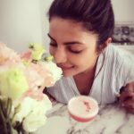 Priyanka Chopra Instagram - Wake up and smell the roses 🌹🖤⭐️ @whilewewereyoungnyc