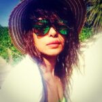 Priyanka Chopra Instagram - Drenched and sun soaked... Hey lil girl.......