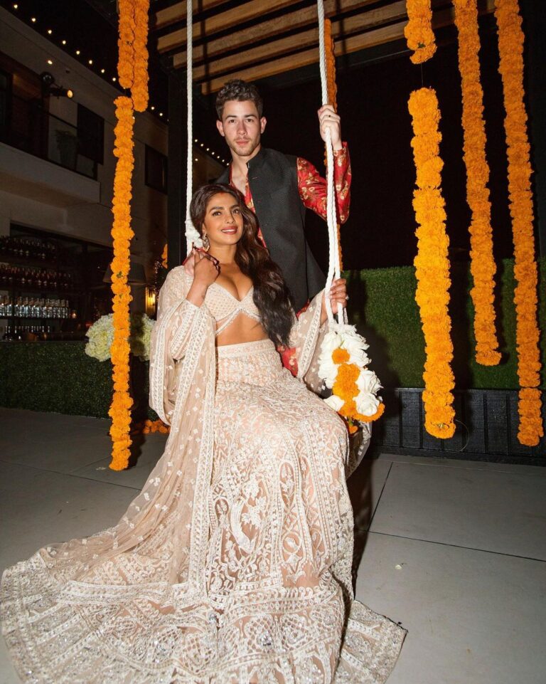 Priyanka Chopra Instagram - Our first diwali in our first home together ❤️🪔✨ This one will always be special. Thank you to everyone who worked so hard to make this evening so special. You’re my angels. To everyone who honoured our home and my culture by not only dressing the part but dancing the night away, you made me feel like I was back home. And to the best husband and partner @nickjonas, you are what dreams are made of. I love you. My heart is so grateful and full❤️ Happy Diwali 🪔 Makeup: @patidubroff Hair: @bridgetbragerhair Styling: @stylebyami Outfit: @falgunishanepeacockindia Nails: @kimmiekyees 📸: @bobo.xxndigo Bag: @aanchalsayal @wholesam @cathyballflowers @walkersmarsh @jaybharatfoodsla @rtkitchen_ @sanssho @hungryempire @acehighcasinorentals @tacer_losangeles @archiverentals @vogue.candles @anarbaghbeverlyhills @liquidcatering @msiyengar @hennadilse @laflowerwall @ohwattanight @gold.frame @djrekha @mohamedassanisitarist @socalhookahs @abcvalet @lagolfcartrentals @andygump @partycrushevents @lulicrafts Los Angeles, California