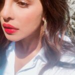 Priyanka Chopra Instagram - A cherry lip and sunshine...❤️...maybe even a earring...I’m feeling adventurous 😊 Los Angeles, California