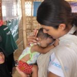 Priyanka Chopra Instagram – This is little Shohida (8 months old), who stole my heart with her infectious smile. It’s a poignant reminder of the dichotomy of life…here she was getting all the help she needed, when just a few months before, her mother, Alada (who was only 19 years old at the time) walked for 15 days, while 6 months pregnant with her ,to get across the border.  It shows us that there is hope left in this world. 
When you’re dealing with a mass exodus of thousands of people, who have been displaced from their homes and are desperate for refuge, the need for proper health and nutrition takes center stage…especially for women and children. 
On the various Unicef Field Visits I have taken, I am always surprised by the simple yet effective solutions that @unicef and their partners develop to deal with the most dire and pressing situations and issues.  This is something I experienced again today during my visit to the Nutrition Centre at the Jamtoli camp in Cox’s Bazar.  More than 60,000 babies have been born in the camps over the past 8 months, so this center is an essential resource for new mothers to learn about proper feeding and nutrition. 
It all begins with the MUAC, a process where the child’s middle upper arm is measured to ascertain their nutrition level.  From there, aids create a program for the child and a nutrient rich, ready-to-eat peanut paste is portioned out for each child based on the severity of malnutrition. At the Center mother’s are also taught basic hygiene and good health practices when they are in their homes. 
The world needs to care. We need to care. Please lend your support at www.supportunicef.org #childrenuprooted @unicef @unicefbangladesh Cox’s Bazar, Bangladesh