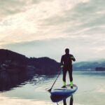 R. Madhavan Instagram – HAPPY HOLI ALLL..🎉🌈🌈🌈..When I feel closest to the Almighty, SUPping on this tranquil lake doing my fav workout.. HOW VERY SURREAL..colddddd but the experience is unparalleled..🙏 #rocketryfilm #actormaddy #SUPonthelake #rmadhavan