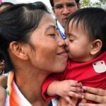 Raai Laxmi Instagram - #marykom with her son at Asian games🙏#respect #salute #girl power 👍❤️😘