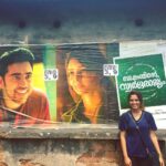 Reba Monica John Instagram - Posing beside a poster🙊 #jacobinteswargarajyam #FortKochi #movie #poster #feel