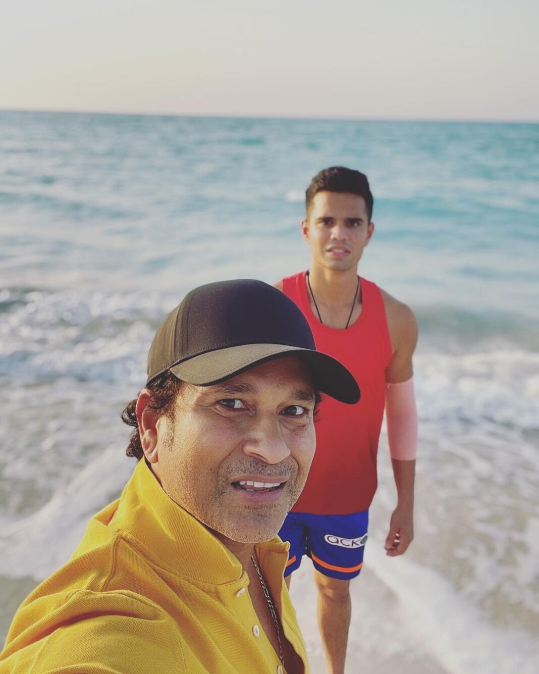 Sachin Tendulkar Instagram - With my SONshine! #beach #sea #fatherson #abudhabi