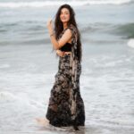 Sherlin Seth Instagram - A love affair between the sea and the saree! #waterbaby With my favourite team 🧡 @abhinay_venkat @vinaydev628 @demarcofq @pavantanooj_photography @_a.w.o.l_ . . . #saree #sareelove #beachlife #beachvibes #sherlinseth #tamil #tamilactor #telugu #tamilponnu #unarvugalthodarkathai #beautifulgirls #kashmirigirls #nomakeup #foryoupage #forme #viralpost #viralreels