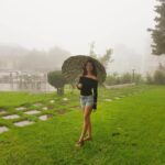 Sherlin Seth Instagram – Engulfed by the clouds. They make my skin flushed pink and my hair frizzy❤️ Bhagsu Waterfall, McLeodganj