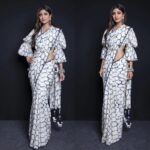 Shilpa Shetty Instagram - Desi glam mode for Super Dancer Chapter 3 Wearing: @punitbalanaofficial Earrings & ring: @apalabysumitofficial Stack: @sangeetaboochra @minerali_store Styled by: @sanjanabatra Assisted by: @akanksha_kapur Makeup: @ajayshelarmakeupartist Hair: @sheetal_f_khan Photograph: @khushghulati Managed by: @bethetribe #superdancerchapter3 #judge #dancer #sonytv #dance #television #show #talent #detemination #tvshow #mondaymood #ootd #saree#lotd #desi #vibe #tiedye #dancers #dancing #sareenotsorry