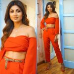 Shilpa Shetty Instagram - On the sets of #duskadum Outfit: @thisispeaceandlove Jewels: @azotiique Heels: @zara Styled by @sanjanabatra &@akanksha_kapur Makeup: ajayshelarmakeupartist Hair: @sheetal_f_khan Photograph: @tushar.b.official Managed by @bethetribe #ladyinred #chic#shootdiaries #instagood #instaglam #poser #lovered