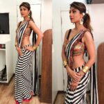 Shilpa Shetty Instagram – Super Dancer look for today in @qbikofficial sari, @anomalybyanam earrings & @amrapalijewels cuffs!
Styled by @sanjanabatra ,Assisted by @akanksha_kapur
Make up @ajayshelarmakeupartist hair by @sheetalfkhan
Managed by @bethetribe
#sarinotsorry #instapic #desitribal #superdancechapter2 #beautiful #ootd #gratitude #picoftheday