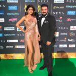 Shilpa Shetty Instagram – With my arm candy @rajkundra9 😘😘😬love u so much for letting me be me #greencarpet #hubbylove #iifa2017 #genderequality