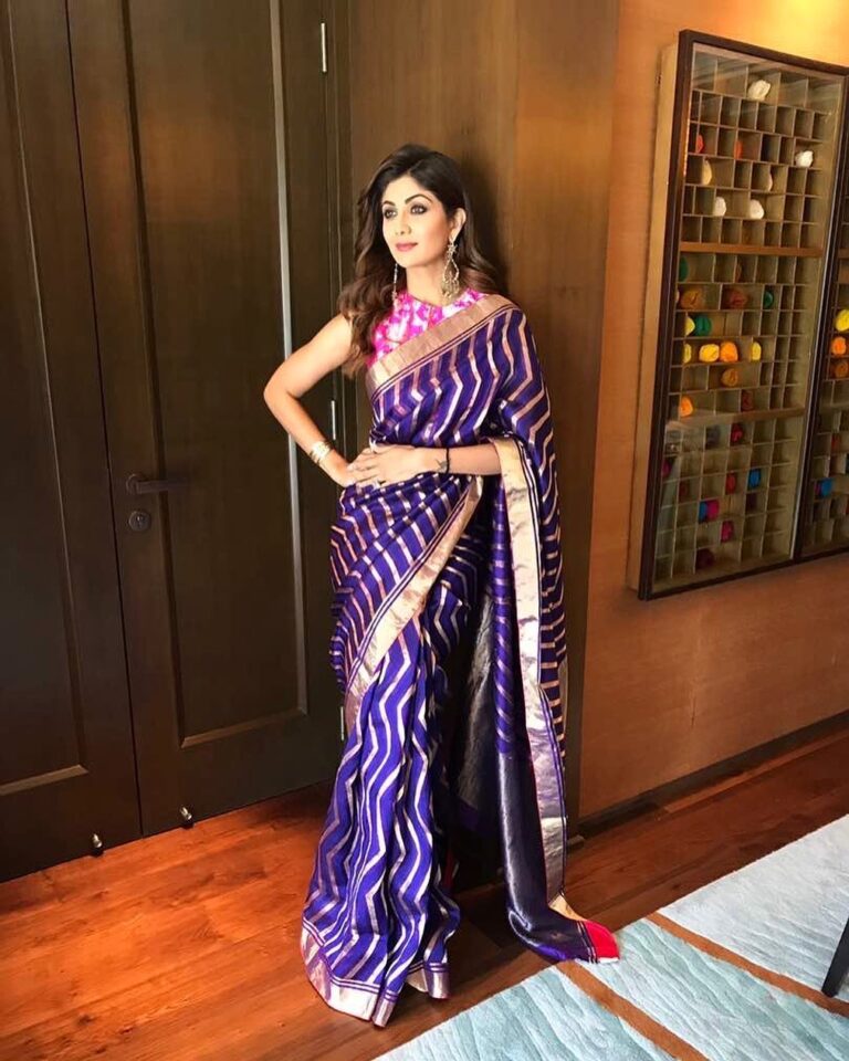 Shilpa Shetty Instagram - Indian handlooms sarees are such a treasure to own! The artistry involved, their uniqueness, and the efforts invested make each piece so incredibly special. Our culture & heritage are so richly woven into them that owning & wearing one makes you feel extremely special. Sharing a glimpse of one of my all-time favourite sarees with you. It looks & feels so regal & elegant, but is light as a feather & so easy to handle. On National Handloom Day today, I salute all the weavers who make hand woven garments look so effortless. I am #VocalForHandmade, are you? ❤️ @narendramodi, @smritiiraniofficial, @ministryoftextilesgoi . . . . . #NationalHandloomDay #VocalForLocal #handlooms #IndianHandlooms #MadeInIndia