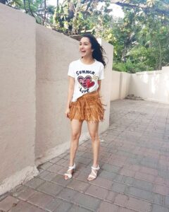 Shraddha Kapoor Instagram - La la la ! This evening... promoting on release day!Thank you to my wonderful team & everyone who was a part of the promotions for such a good time & all the laughs! It was hectic but so much fun. Top - @tommyhilfiger @tommyxgigi Skirt @demebygabriella Shoes @charlesandkeith styled by @tanghavri assisted by @nidhijeswani make up & hair @shraddha.naik @florianhurelmakeupandhair managed by @parinaparekh #DreamTeam ❤️ #HALFGIRLFRIEND #UnderMyBuildingPhoto
