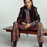 Shruti Haasan Instagram - 🧡🖤 Carpet print satin silk shirt, carpet print sheeted crepe trousers, both @NikitaMhaisalkar, faux leather jacket, @H&M, ‘Bibooty’ boots @ChristianLouboutin, mini flow hoops, stackable pebble rings, flow combination rings, all @Misho, apollo double trouble crater hoops, divided signet ring, both @ShopLune, Java coffee table, @barodesignindia @graziaindia Jan 2021 Photographed by @aneevrao Styled by @surbhishukla Fashion assistant: @thestyleattendant Hair and make-up: @devikajodhani assisted by @ritashukla22 Words: @barrynrodgers PR: @p2communication