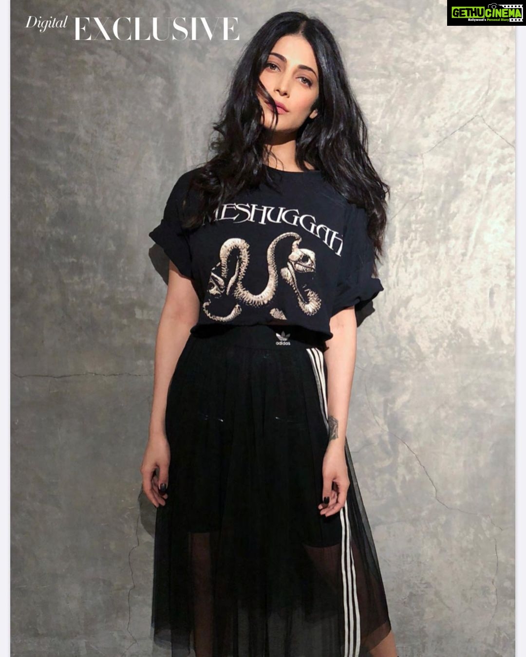 Shruti Haasan Instagram - Had so so much fun shooting this and the amount of love I got for the meshuggah t shirt is insane ππ€π½ I used my #iphone11promax to shoot this along with a tripod and a really crappy old selfie stick tied together with the belt of a bath robe π really technical stuff π€ Iβm also writing a lot more music since this came out which means all feelings matter - especially how youβre feeling right now π€ big hugs to everyone