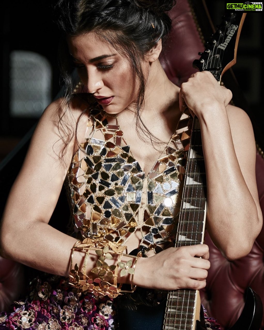 Shruti Haasan Instagram - “I write from the place of knowing that we get to play different characters musically.” Here, in a mirror-embroidered blouse by @simplySimone.official Browse the digital issue at magazine.azafashions.com, or pick up a copy at Aza stores. Accessories: @mrinalinichandralabel, @amrapalijewels Photography: @Arjun.mark Styling: @sanjanabatra Art Director: @prashish_moore Make up: @dilshadukaji_mua Hair: @ritashukla22 guitar: @officialibanezguitars