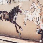Sonakshi Sinha Instagram - Saw these horses and thought to myself “wish i was as wild and free”... only to realize, i am the one who’s wild and free, while they’re stuck on a wall! #streetart #mondaymusings #shootshennanigans