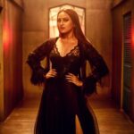 Sonakshi Sinha Instagram – #IttefaqSe out now! Click the link in my bio to watch! Outfit by my favorite @manishmalhotra05! Beauty by @divyachablani and hair by @themadhurinakhale ❤️ #sonastylefile #gothglam #blackisback