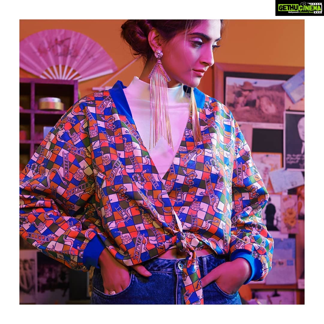 Sonam Kapoor Instagram - It’s always game on when our ‘Checks with a twist’ Jacket is inspired by the ultimate 80s board game - Snakes And Ladders. 🐍🎲 Check out the entire collection on @amazonfashionin and @shoppers_stop! #80sCollection #NoRhesonICant #80sFashion @wearerheson @rheakapoor
