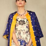 Sonam Kapoor Instagram – Witness the splendour of local and global brands all under one roof at the Doha Jewellery and Watches Exhibition 💛💙
#DJWE2020  @visitqatar

Dress – @etro
Jacket – @ekayabanaras
Jewels – @bulgari
Watch – @iwcwatches
Shoes – @shutiqofficial
Make up – @artinayar
Hair – @bbhiral
Styling – @rheakapoor
Team – @manishamelwani @sanyakapoor @ria.kothari @aleeyasheikh
Photos – @thehouseofpixels
Manager – @neeha7 Doha Exhibition and Convention Center – DECC