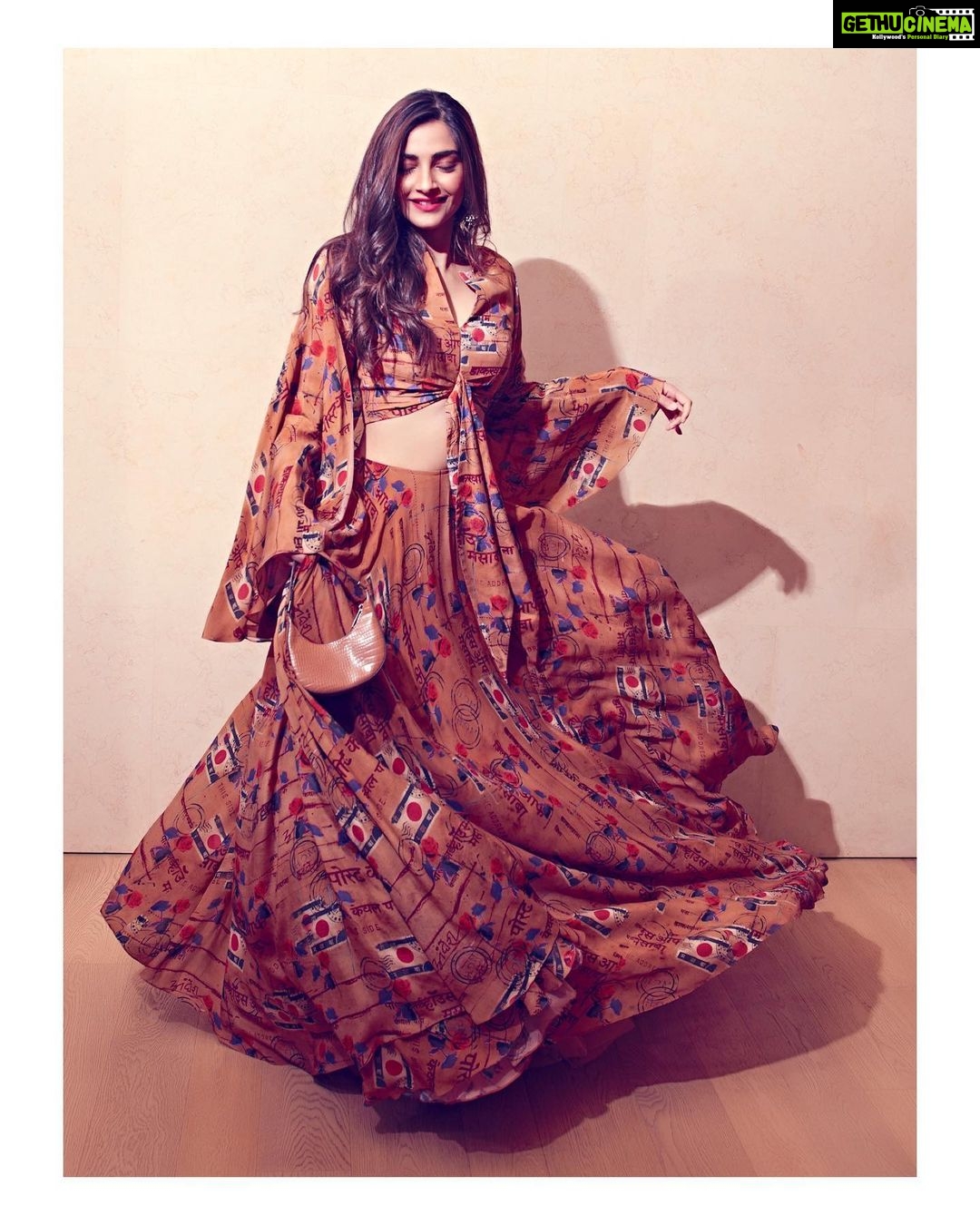 Sonam Kapoor Instagram - Say hello to my new favourite - The Lost Letters Printed Lehenga from the Masaba x Rhea Collection! #TheChroniclesOfFemininity @rheakapoor @masabagupta Earrings - @amrapalijewels Hair - @bbhiral Makeup - By me! 💁🏽♀️ 📸- @thehouseofpixels