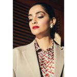 Sonam Kapoor Instagram - Lucky Red💄 For the #TheZoyaFactor Promotions Shirt,pant and hair scarf - @burberry Jacket - @maisonmargiela Earrings - @irasvajewellery Rings - @amrapalijewels @sapnamehtajewellery Bag - @chanelofficial Style @rheakapoor Team @manishamelwani @vani2790 @sanyakapoor Beauty @artinayar Hair @alpakhimani Manager @neeha7 Photographs @thehouseofpixels