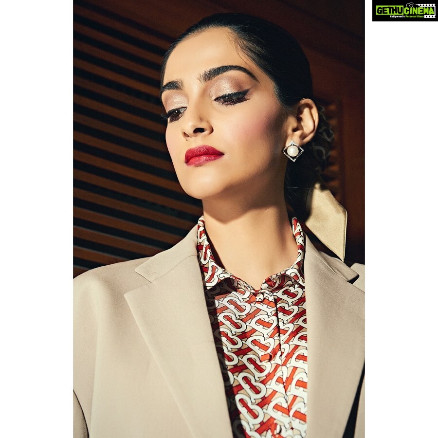 Sonam Kapoor Instagram - Lucky Red💄 For the #TheZoyaFactor Promotions Shirt,pant and hair scarf - @burberry Jacket - @maisonmargiela Earrings - @irasvajewellery Rings - @amrapalijewels @sapnamehtajewellery Bag - @chanelofficial Style @rheakapoor Team @manishamelwani @vani2790 @sanyakapoor Beauty @artinayar Hair @alpakhimani Manager @neeha7 Photographs @thehouseofpixels