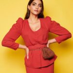 Sonam Kapoor Instagram - 🔴 Day 2 #TheZoyaFactor In @ulyana_sergeenko_moscow Bag: @ulyana_sergeenko_moscow Shoes: @prada Earrings: @thelinehq Rings: @gehnajewellers1 & @anmoljewellers Styled by :@rheakapoor Assisted by: @manishamelwani @vani2790 @sanyakapoor Hair by: @alpakhimani Makeup: @artinayar Photographs: @thehousepfpixels Managed by: @neeha7