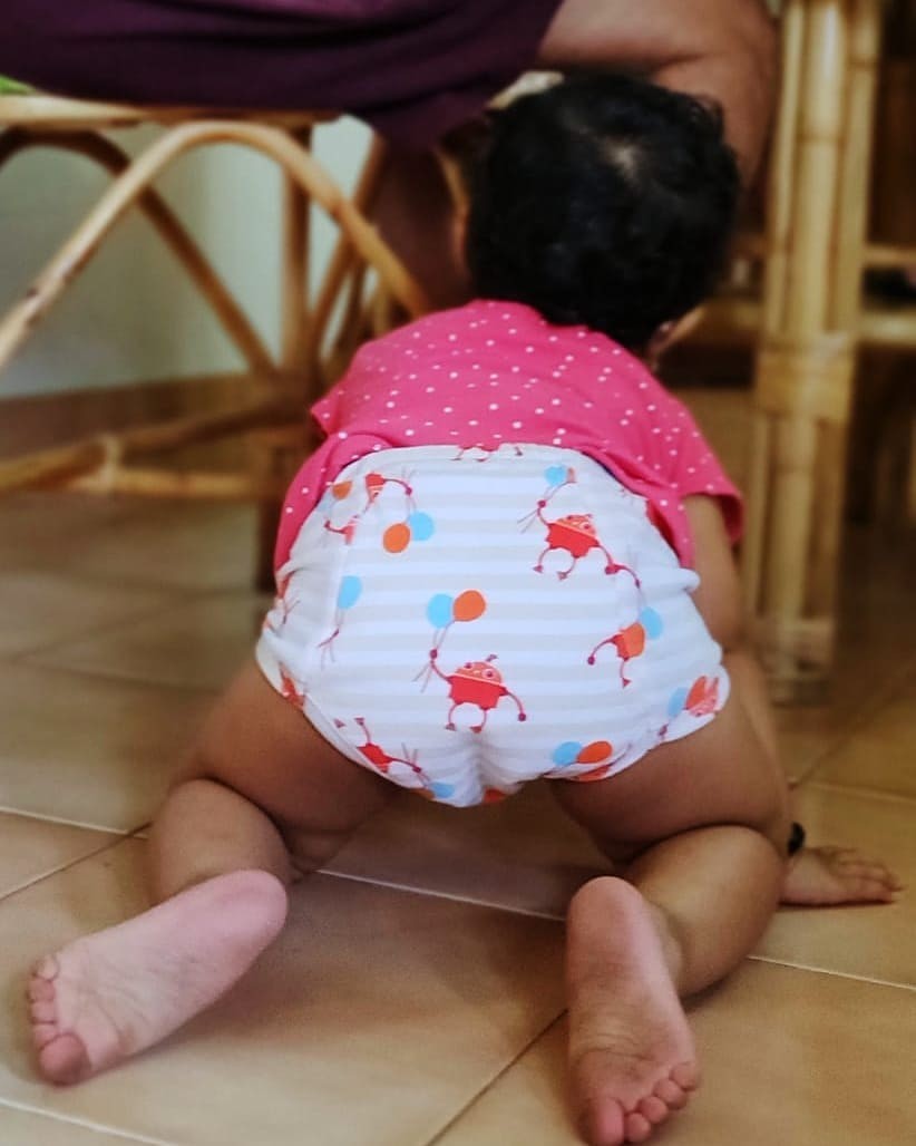 Sruthi Hariharan Instagram - We've hardly used plastic diapers for Janki, and one of the most significant reasons we were able to do that is @superbottoms . As you all know, Janki has mostly been cloth diapered in them. But now that we have started toilet training her, I have picked up their Padded Underwear too. The picture you see above has Janki wearing their padded underwear, which I love because, 1) They hold up to 1 pee and prevent pee puddles and reduce the spoiling of my sofas and beds. 2) These trainer pants are also a boon since children feel the wetness and start to communicate (oh so cutely) that they've peed. I believe this is the first step to toilet training. 3) It's very breathable and comfortable for children which again is much needed 4) It Comes in fun and colourful designs, which my baby loves :) Go check out @superbottoms . I'm sure you will love them as much as I do. You can use code JANAKI10 to get an instant discount on your purchase. #ToiletTraining #SuperBottoms #paddedunderwear #pottytraining #clothdiaper