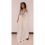 Sruthi Hariharan Instagram – This handpainted saree with pearl embellishments on the blouse is from @mahitha_prasad, and women like her come with many facets. A loving mother, an extremely driven entrepreneur and a superb designer, she is a woman who will lose her heart to anything simple, elegant and honest . And what I love about her, is her forever unflustered demeanor. The sky could fall down, but you will find Mahitha always smiling and ready to take it on ! Such women seldom exist and I can’t say it enough – @prayok_photography what a lucky guy you are 😊 .
.
So thank you @mahitha_prasad for this lovely saree and for every other time you have stepped in and collaborated with me. I love you ❤ 
Also wearing another gorgeous piece of jewellery from @unniyarchajewelry – thank you for always being there . 
Styled by @bapatshweta . 
MUP by yours truly 🙃
For the 10th AKKA world conference at Dallas. 
#sareeagain #shorthairlove #sareeschic #thatscool #postsgalore #globetrotting #postingfrombangalore #youcanbeanywhereintheworld #onsocialmedia #thatscooltoo Sheraton Dallas Hotel