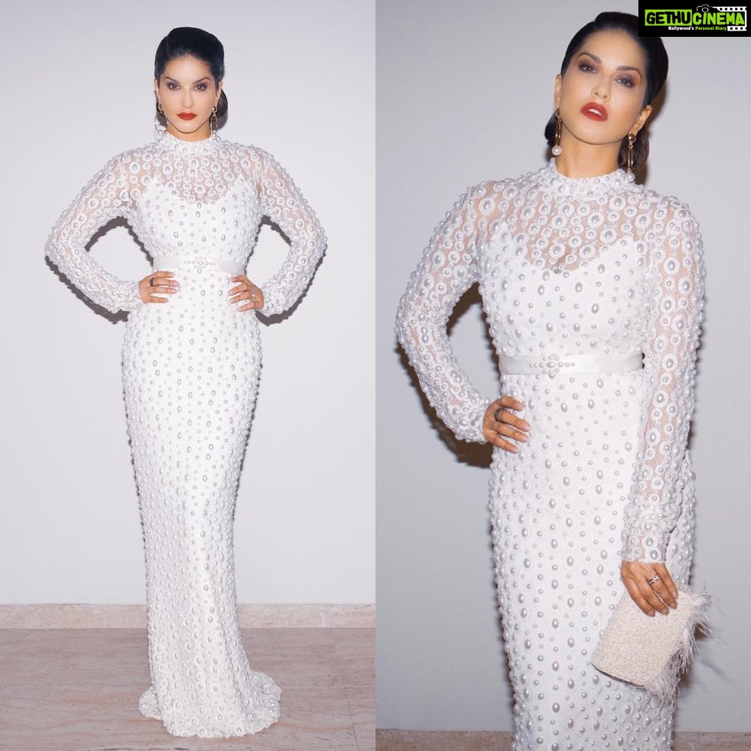 Sunny Leone Instagram - Love love loved this gown! I’m also completed my look wearing “Cherry Bomb” by @starstruckbysl Outfit: @kujtameri Jewellery: @presh_houseofstones Clutch: @ru.saru Styled by @hitendrakapopara Styling Asst @shikha_gupta07 HMU @tomasmoucka @jeetihairtstylist Photo by @tomasmoucka