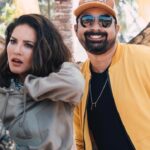 Sunny Leone Instagram - Hmmmm...I have no idea what I lost in my shirt...but the real question is.... what is @rannvijaysingha doing?? Lol