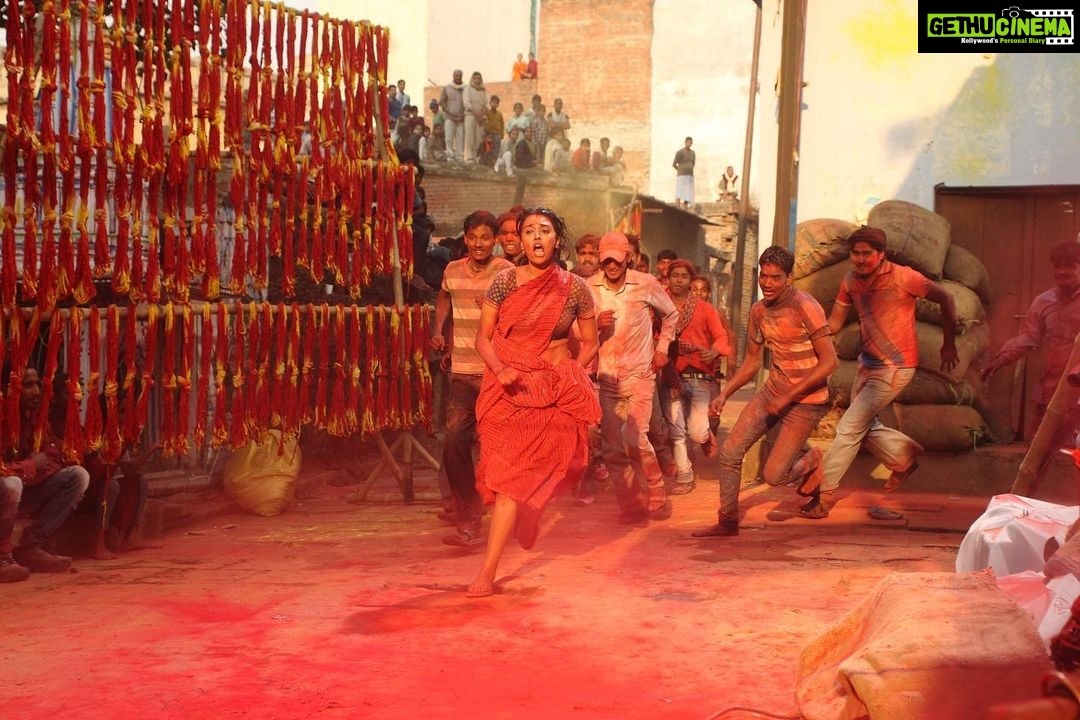 Swara Bhaskar Instagram - These are stills from #raanjhanaa Of the #holi sequence that we filmed in #banaras in the freezing winter of mid-December 2012! Writer #himanshusharma had beautifully written a grand Holi sequence into the screenplay capturing the energy, scale, bhaang-induced madness of Banaras's traditional Holi. It took us 3 days to shoot and the days chosen were 20, 21 and 22 December the COLDEST days of the year. The art department had also constructed a keechad (mud/slush) pool, very thoughtfully filled with warm water which soon turned cold!!! There were almost 200 plus junior artists used for the scene, some of whom were pouring buckets of water from terraces on us while we ran through the streets. I was scared of slipping and thus was barefoot!!! i have NEVER been so cold in my life as i was those three days. But it was the MOST fun i've ever had shooting. It was also the first time in my life that i played Holi in a sari.. The production was very sweet and kept blankets and buckets of hot water ready for us while we waited between shots. Interestingly the writer Himanshu Sharma was missing during the filming of this sequence, he did not come on set as all the actors had sworn to throw him into the keechad pool for writing such a long and vast Holi sequence! :) #throwback #shootlife #RaanjhanaaMemories #6yearsofraanjhanaa