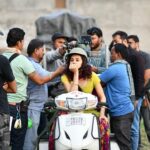 Taapsee Pannu Instagram - This throwback is clearly out of missing the madness we thrive in as actors. The calm we find in the most crazy situations. Need to get back to the chaos soon :) Btw that’s a rig being attached to my scooter to test my balancing skills. Both with the weight n emotions in the take. #Throwback #Archive #QuarantinePost