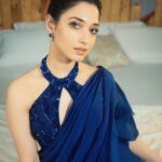 Tamannaah Instagram - Not so saree Outfit - @babitamalkani Jewellery- @mozaati Styled by - @sukritigrover Styling Team- @vanigupta.23 Makeup - @divyachablani15 Hair - @tinamukharjee 📸 - @raj_nagada Managed by- @pretty_lohia @prathacanser_03 #SarinotSorry #Ootd #bluevibes