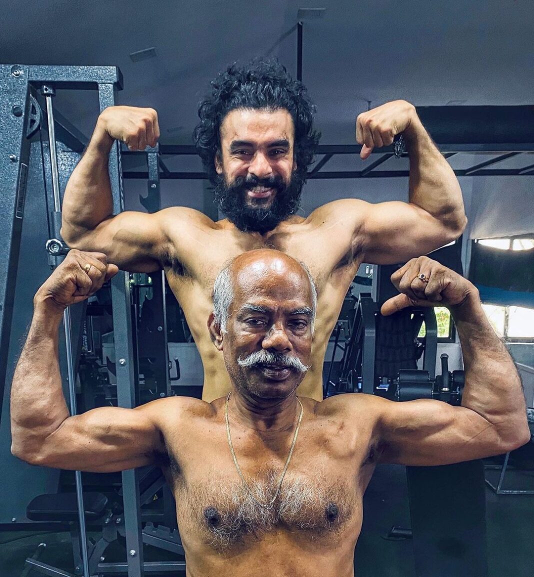 Tovino Thomas Instagram - My dad. Guide. Advisor. Motivator. Decision maker. And workout partner. #fathergoals The extra muscle on his left upper chest is a pacemaker fixed in 2016, but since then he has been into fitness more than ever! #fatherscores Irinjalakuda