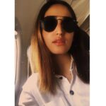 Yami Gautam Instagram - White shirt , black shades, so let’s fly high 🙋🏻‍♀️ #loveforrandomcaptions😋
