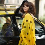 Adah Sharma Instagram - Taxi or Rickshaw ? Back to back💛🖤💛🖤 SWIPE to the last pic to see the story of my life 🥲🥲🥲 . . . Kaali Peeli 💛🖤💛🖤 📸@biryanimasala Styled by @juhi.ali Hair @snehal_uk Saree @suta_bombay @rubansaccessories Heels @charleskeithofficial @jagats38 #filmfare #filmfareawards #100YearsOfAdahSharma #adahsharma