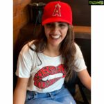 Akshara Gowda Instagram - Over- sized cap ..... APPLE of my own eyes .. And in my head I play a SUPERCUT of us ❤️❤️❤️😻😻 so in short LIFE IS GOOD 💋🍎 #aksharagowda #stylishtamizhachi #kissmelikeyoumissme #losangelesangels #baseball