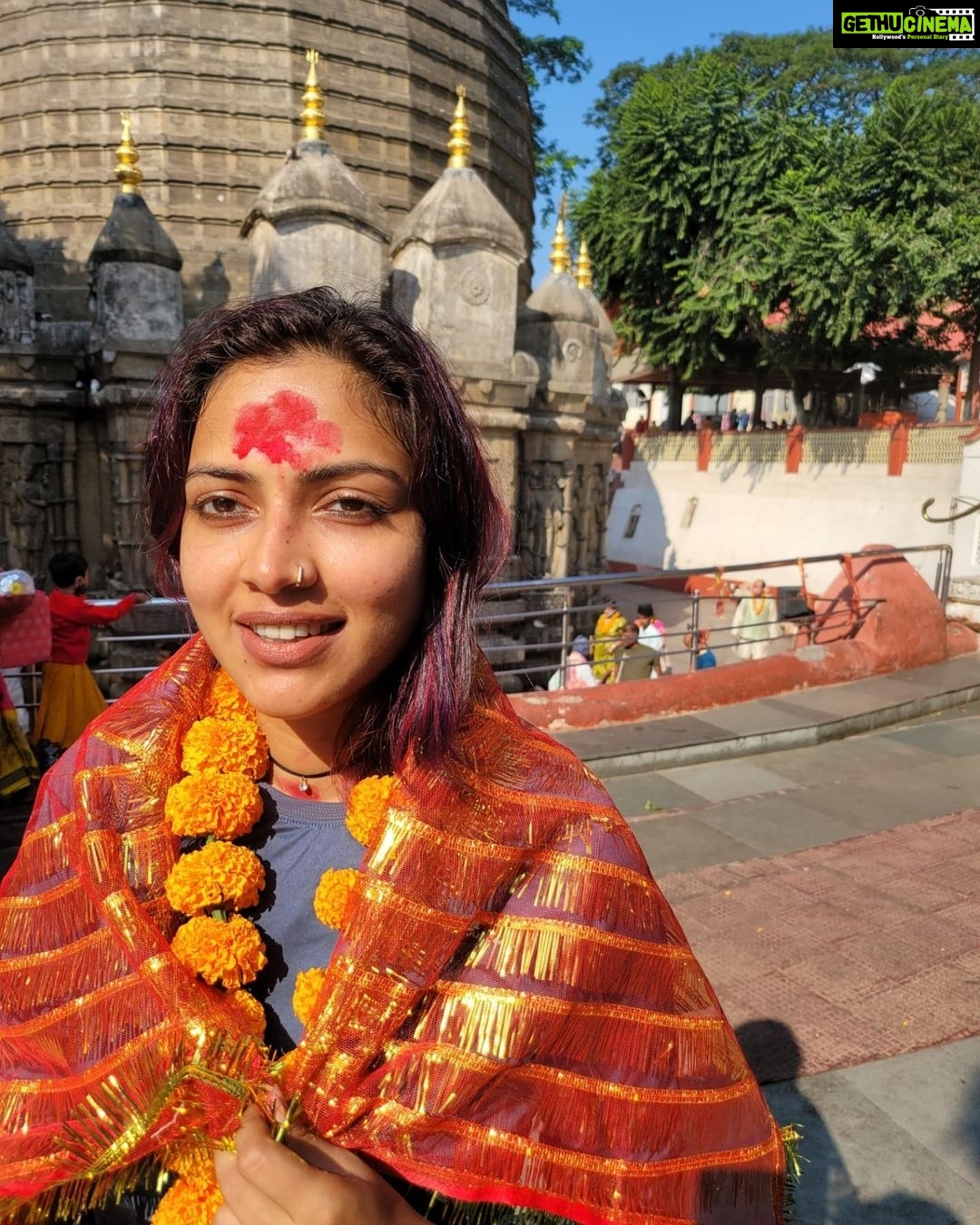 Amala Paul Instagram - Scrapbooking my trip to Assam: Just basking in the glory of Shakti ~ The divine feminine power. 💮 The Kamhakya Devi temple rests atop the Neelachal Hill at Guwahati. The temple was built to honor the bleeding Mother Goddess Kamhakya Devi. According to the Kalika Purana, Kamakhya Temple denotes the spot where Sati's Yoni fell after Shiva tandav. The temple celebrates the 'shakti' within every woman. For someone who deeply believes in the lessons of the soul, visiting this temple was more than a mere mortal experience. I truly experienced the power within, the power is not to be mistaken with extreme aggression; a true sense of calmness and a stoic silence within me defines power for me. I gave myself to the mother and came back with the child inside me intact. 💟 #traveldiaries #soulfood #soultales #moonchildmusings #grateful #shakti