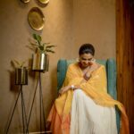 Amala Paul Instagram – I’m all about the fusion. I like taking conventional things and adding my own dash of quirk to it. It’s not about what you wear, it’s about what special touch you add to the outfit that makes the difference! 
P. S: Bangles on one hand and watch on the other. Best of both worlds! (3/3) 
#Aadai #Aame #Aadaipromotions #blessed #StyledByYoursTruly #AmalaPaul
.
.
📸 : @kiransaphotography 💄: @monalimakeovers 💇‍♀️ : @manjula7038 🏡 : @varnamalaweddingexperience