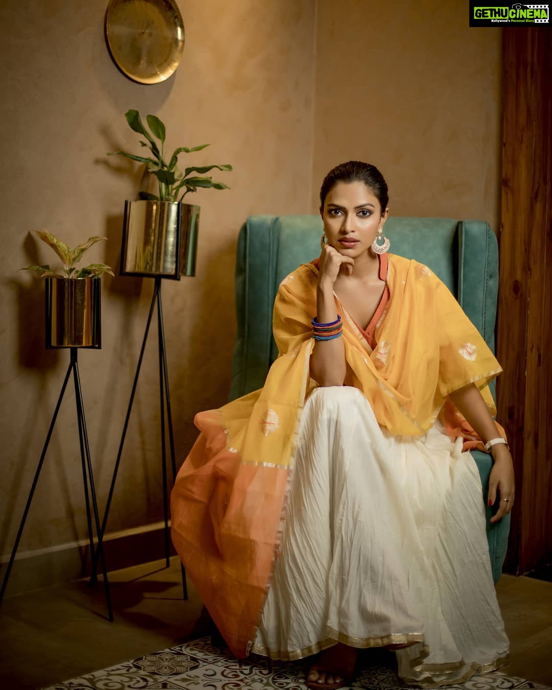 Amala Paul Instagram - I'm all about the fusion. I like taking conventional things and adding my own dash of quirk to it. It's not about what you wear, it's about what special touch you add to the outfit that makes the difference! P. S: Bangles on one hand and watch on the other. Best of both worlds! (1/3) #Aadai #Aame #Aadaipromotions #blessed #StyledByYoursTruly #AmalaPaul πΈ : @kiransaphotography π: @monalimakeovers πββοΈ : @manjula7038 π‘ : @varnamalaweddingexperience
