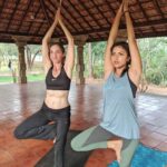 Amala Paul Instagram - Put your hands up in the air and...say Namaste! 🙏 With my guruji @christineauroville #ashtanga #mayyogaalwayslightourpath #pondylife #sunday
