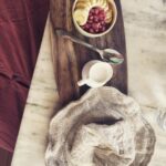 Amala Paul Instagram – Summer time breakfast at most fav @breadandchocolate_india 💕

#sundayvibes #postsurfingtreat #cacaogranola #fruits #coconutmilk #healthyeating Bread & Chocolate