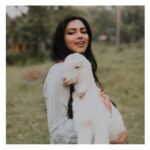 Amala Paul Instagram - When I see this pic, I remember the touch and warmth of that little lamb. I knew at that moment, I was alive! ✨ . . . #freespirit 📷 @rishabh_malik04