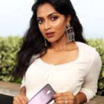 Amala Paul Instagram - Living the good life with the #OnePlus6T in #ThunderPurple | If you want to win this fantastic smartphone, go follow @OnePlus_India to be eligible. #unlockthespeed