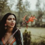 Amala Paul Instagram – An actor prepares.

Leaf by leaf sheds the tree,
An actor prepares with her masks equivocally.
Mask by mask, you come to know of me,
When there is no mask,
I stand naked among thee!! AP

#themirage #poetsofinstagram