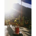 Amala Paul Instagram - Good trek, Good tea, Good view. Kashmiri kahwa after a long trek with the view of the beautiful sunset🌅 at Turtuk village. #ladakhdiaries #Himalayas #Trek #Sunset #innerpeace #backpack